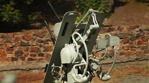 Obsolete, abandoned, and rusty combat guns stand amidst the natural landsca.. Stock-Footage 346328266