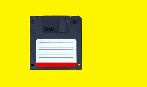 Obsolete computer floppy disks on a colored background, isolated, 写真素材