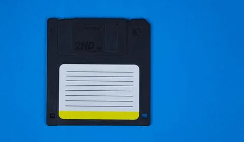 Obsolete computer floppy disks on a colored background, isolated, Stock Photos