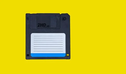 Obsolete computer floppy disks on a colored background, isolated, Stock Photos