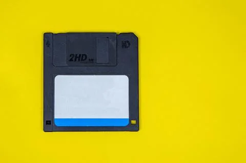 Obsolete computer floppy disks on a colored background, isolated, Stock Photos