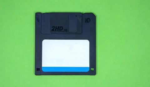 Obsolete computer floppy disks on a colored background, isolated, Stock Photos