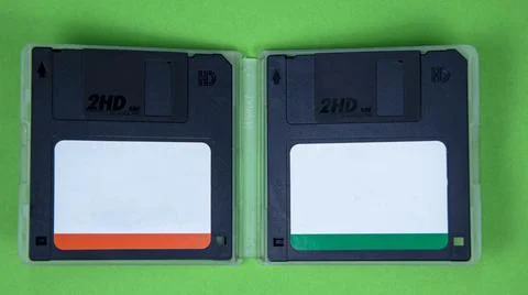 Obsolete computer floppy disks on a colored background, isolated, Stock Photos