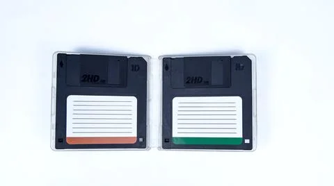 Obsolete computer floppy disks with a flash drive on a white background, 스톡 사진