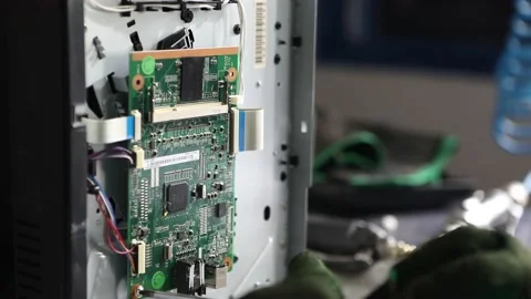 Obsolete computer parts being recycled for reuse or safe disposal - Video stock 149785454