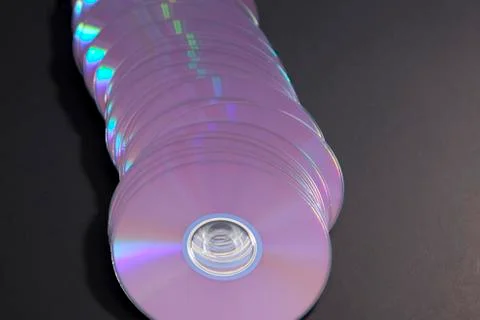Obsolete technology - a row of dvds Stock Photos