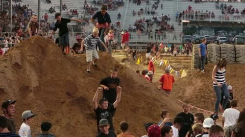 Obstacle course people down final hill fast P HD 0843 Stock Footage