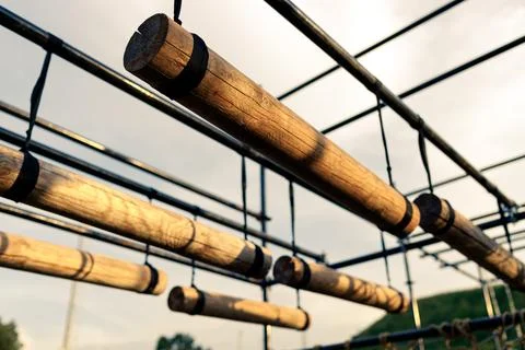 Obstacle course race ocr, horizontal logs in a row, sunset Stock Photos