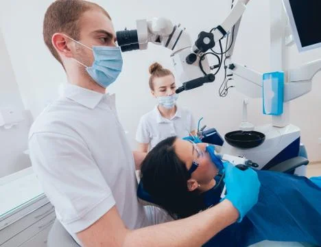 Obturation of root canals during endodontic treatment Stock Photos