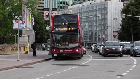 OC Transpo double decker bus on city street in Ottawa Video stock 330677402