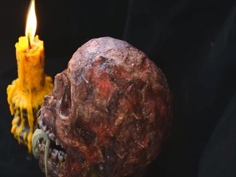 Occult Ceremony with Candles, Ancient Books, Skulls and a homemade devil's game Stock Footage