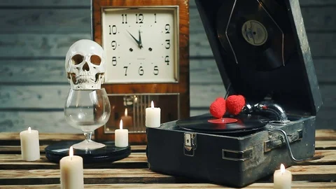 Occult Ceremony with Candles, Skulls and grammofon Stock Footage 83863653
