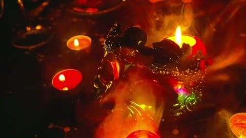 Occult ritual scene illuminated by candlelight and mysterious incense smoke Stock Footage 344880926