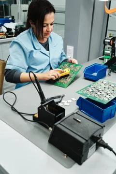 Occupation, technician, shirt, table, computer, pc, circuit board, wor Stock Photos