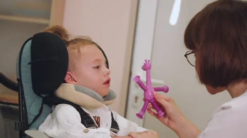 Occupational therapy with a child, children's occupational therapy Stock Footage 313662853