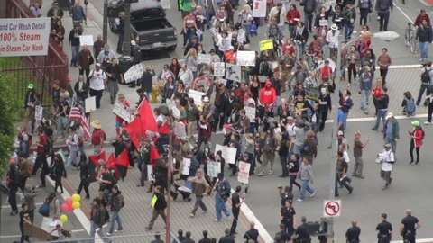 Occupy Marches Down Street Video stock 71632684