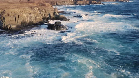 Oceam storm Waves crashing on Huge stone cliff. Dramatic marine scenery Stock Footage 182479804