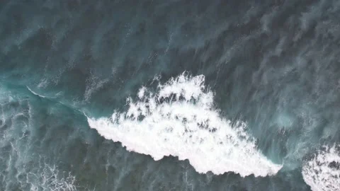Ocean Aerial: Hovering Over Waves at Sawangan Beach Stockbeeldmateriaal 237466994