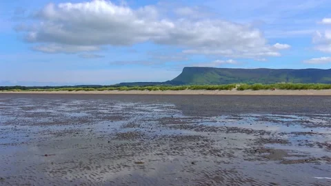 Ocean after low tide sand near the shore Stock Footage 230171443