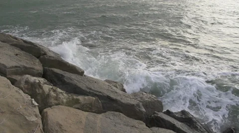 Ocean against rocks  Stock Footage 33844082