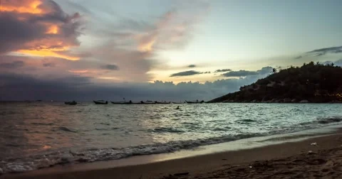 Ocean and beach sunset timelapse, Day to night, Koh Tao Island, Thailand. Stock Footage 68434646