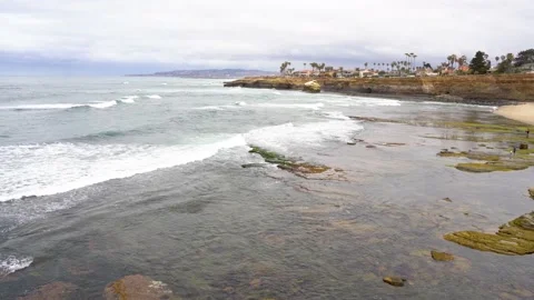 Ocean and cliff views on a cloudy day in San Diego, California Stock Footage 154459721