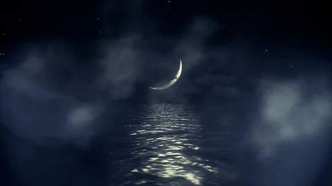 Ocean and Crescent Moon on a Starring Night in Seamless Loop Stock Footage 124855082