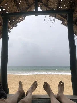 Ocean and legs Stock Photos