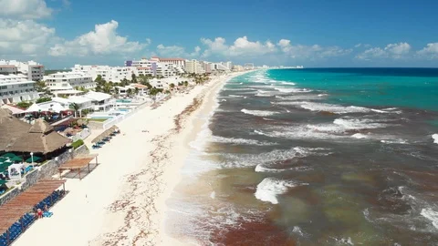 Ocean and sand beach pulling back CANCUN 4K Stock Footage 108355015
