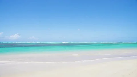 OCEAN Background 4k. Wild clean beach with white coral sand and turquoise ocean. Stock Footage 151667424