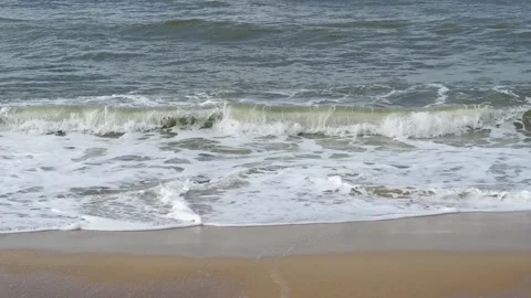 Ocean background live wallpaper. Stormy dark water white sea foam empty sand Stock Footage 204790505
