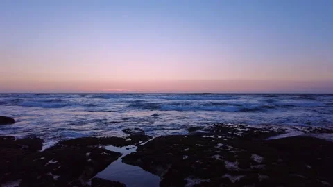Ocean beach with green mountain background. Atlantic ocean with strong waves Stock-Footage 155305686