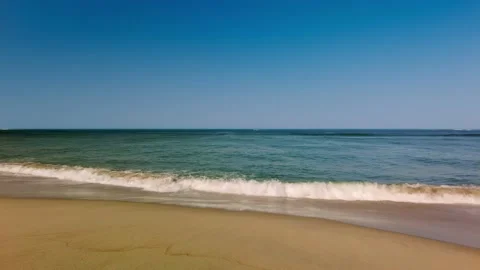 Ocean beach landscape. Water surface with calm waves. Summer travel to the ocean Stock-Footage 153224754