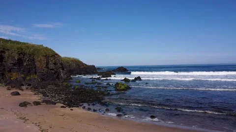 Ocean beach, ocean coast rocks sunny day beautiful Stock Footage 209193226