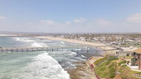 Ocean Beach Pier and Surf Waves Crashing Daytime Wide Shot Stock Footage 311833202