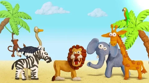 Ocean, Beach Sand. Plasticine Giraffe, Monkey, Lion, Zebra, Parrot, Ostrich Stock Footage 74123338