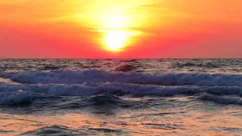 Ocean beach sunrise. Waves splash on the shore Stock Footage 151239455