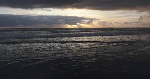 Ocean beach at sunset Stock Footage 165264422