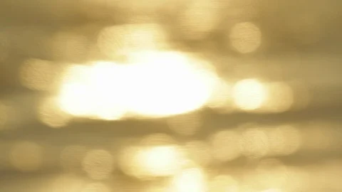 Ocean beach sunset. Out of focus sun on the water B Stock Footage 102403111