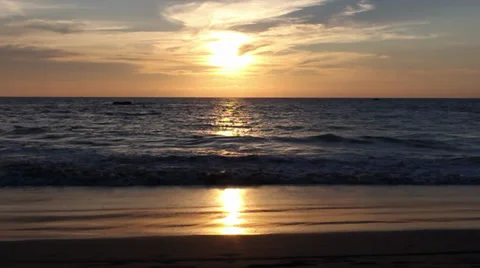 Ocean beach at sunset, small waves Video stock 33198135