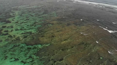 Ocean, beach, temple above the ocean | Bali, Indonesia | 4K video Stock Footage 169072152