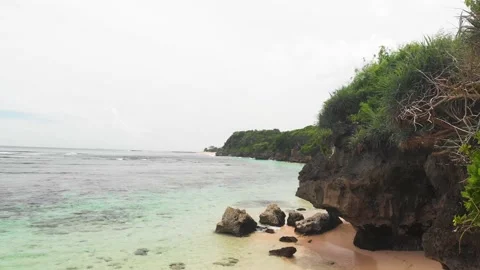 Ocean, beach, temple above the ocean | Bali, Indonesia | 4K video Stock Footage 169072570