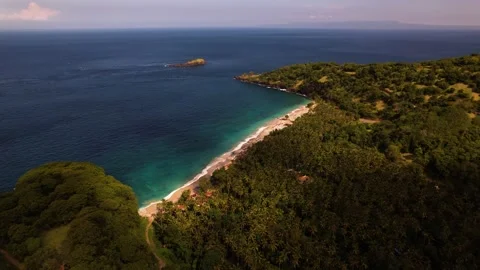 Ocean, beach, temple above the ocean | Bali, Indonesia | 4K video Stock Footage 197929285