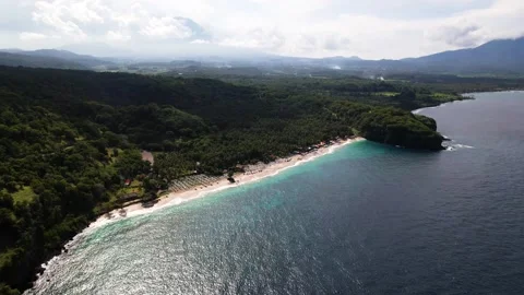 Ocean, beach, temple above the ocean | Bali, Indonesia | 4K video Stock Footage 197929593