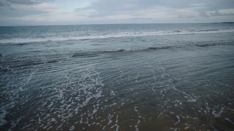 Ocean beach with waves Stock Footage 75946927