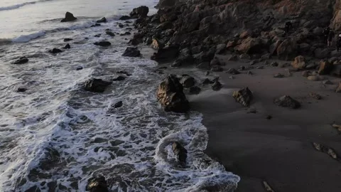 Ocean beachside rocks - drone - 4k Stock Footage 297228852