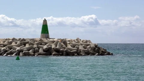 Ocean blue sky lighthouse Stock Footage 74526920
