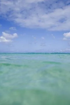 Ocean with blue sky Stock Photos