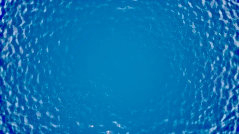 A Ocean blue water reacting in pattern motion graphic Stock Footage 155231723