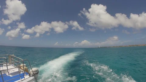 Ocean Boat Moving Away From Another Boat Back View 4k Stock Footage 73556911